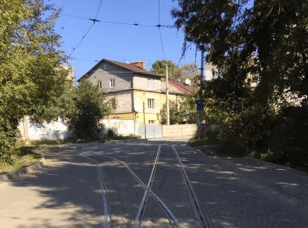 a tranquil tram stop today, entrance to janowska nazi camp between 1941-1943 - lviv holocaust tour and research